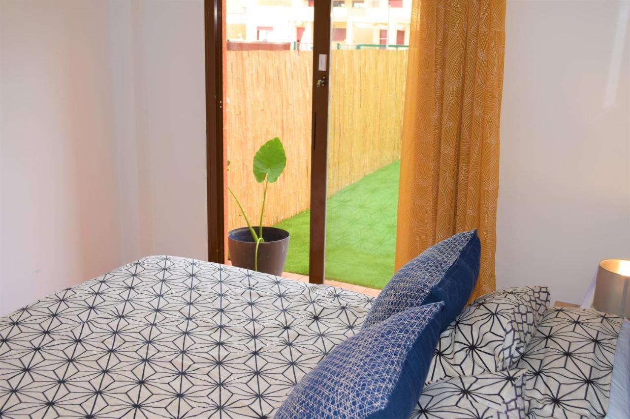 Espacioso apartamento con preciosos jardines y BBQ Isla Plana Exterior foto